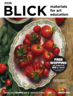 Blick's Art & Craft Catalog: A thick professional art supplies catalog open on a wooden studio table surrounded by paintbrushes and tubes of oil paint.
