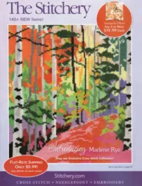 A variety of colorful embroidery threads and needlework patterns from the Stitchery Catalog.